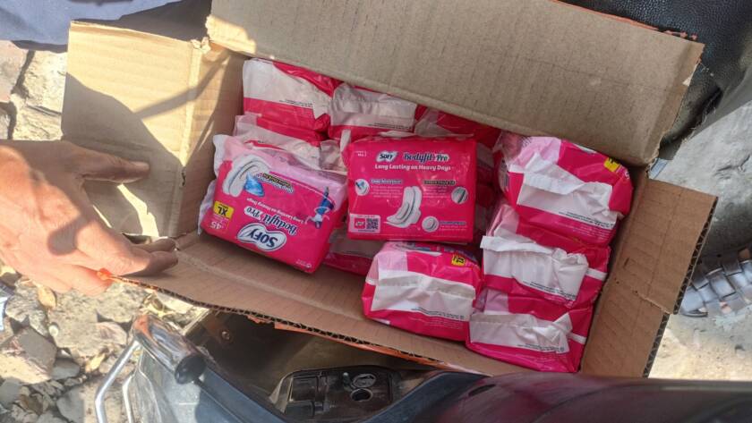 Sanitary pad distribution drive by Feeding Universe